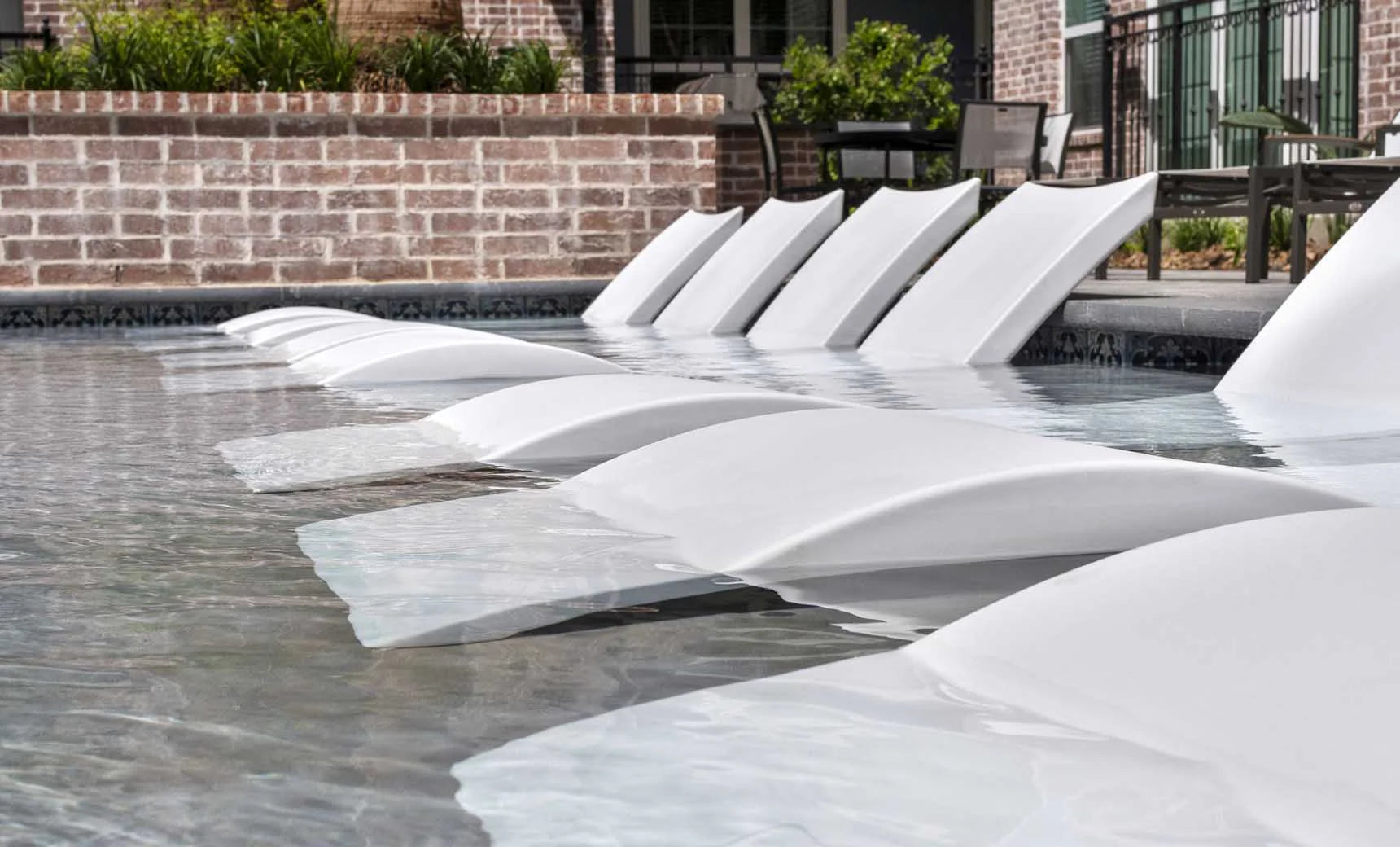 Ledge Signature 70″ Rectangular Resin In-Pool Chaise Lounger
